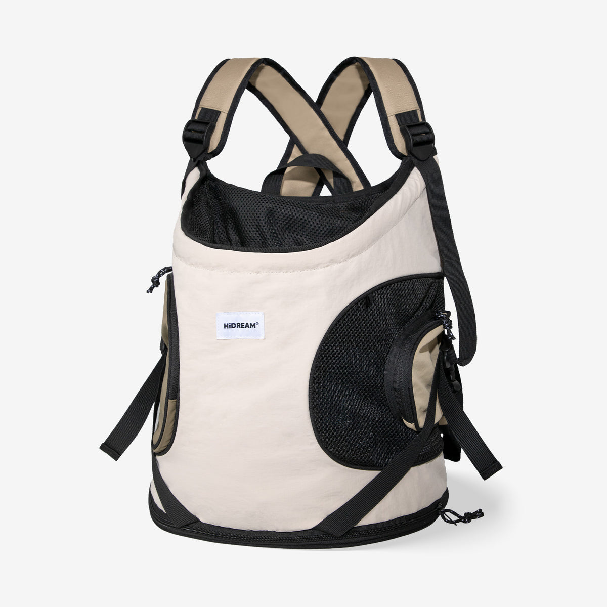 Cream and black front pet carrier with breathable mesh panels and supportive X-back straps