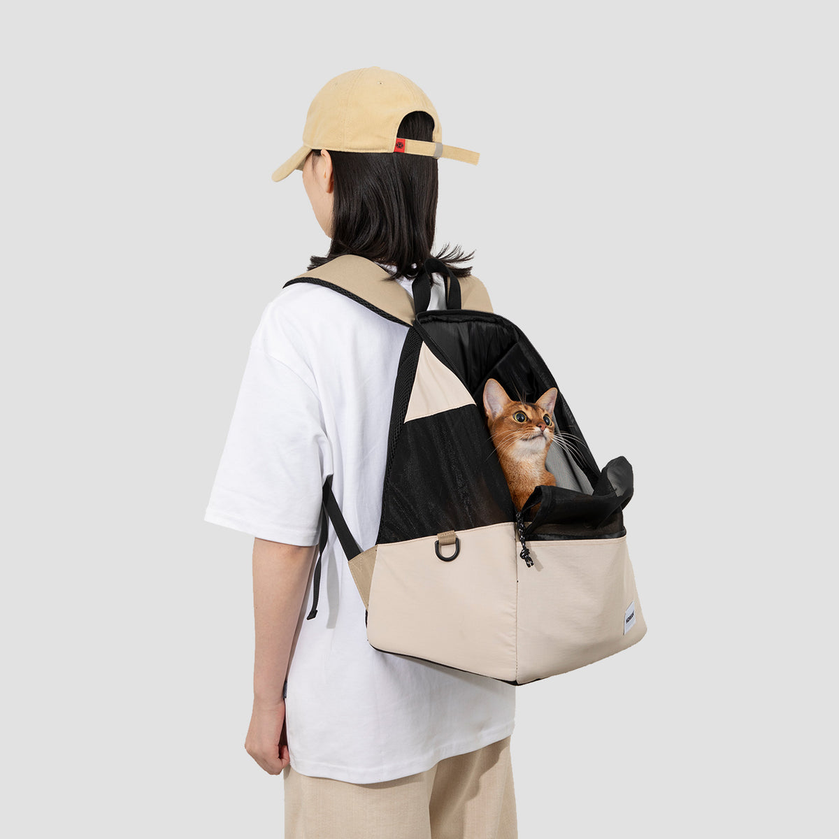 Person wearing a lightweight pet carrier backpack for comfortable everyday outings