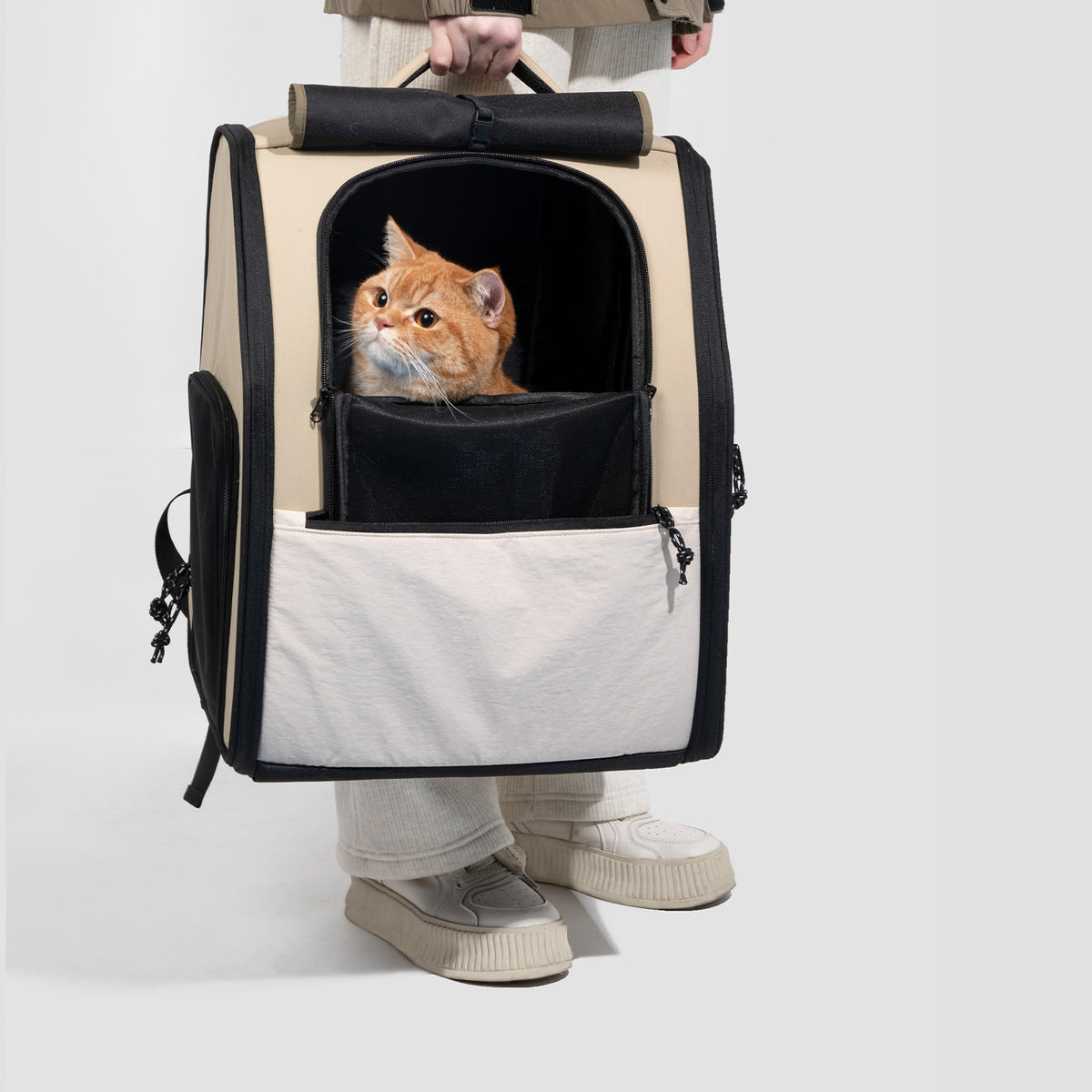 Pet carrier backpack with front opening for easy pet access and interaction during travel