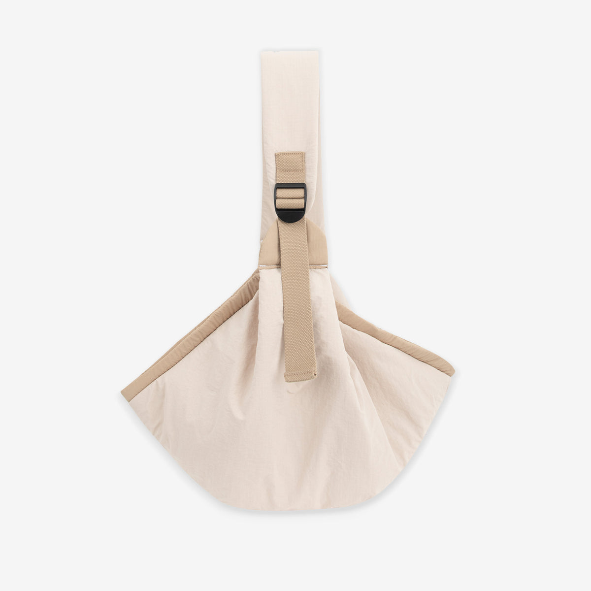 Pet carrier sling side view showing the adjustable opening and wide shoulder strap