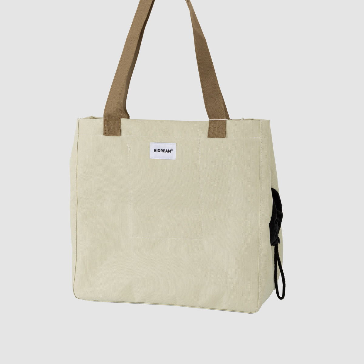 Pet carrier tote bag in almond cream with lightweight foldable construction
